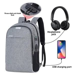 Vue détaillée du verrou antivol avec port de charge USB et prise casque sur le sac à dos gris