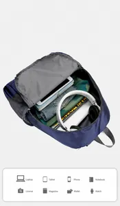Macro view of blue honeycomb fabric backpack showing spacious interior for electronics