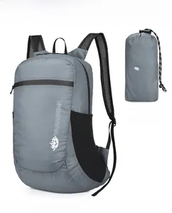 Gray foldable travel backpack shown expanded and stored in its compact storage bag