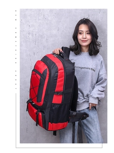 Outdoor sports backpack in red and black with waterproof nylon and elastic cords
