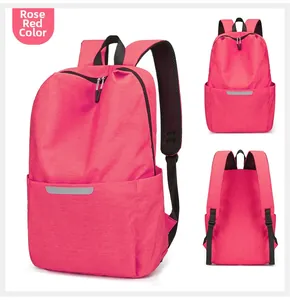 Vues détaillées d'un sac à dos réfléchissant rose rouge avec bretelles en mesh et poches