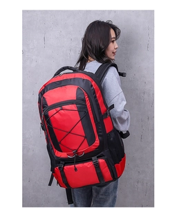 Outdoor sports backpack in red and black, featuring water-resistant fabric and side mesh pocket