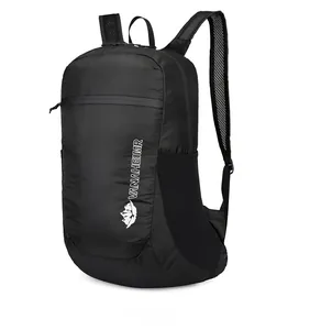 Detail of black waterproof travel backpack with VANAHEIMR logo and mesh side pocket