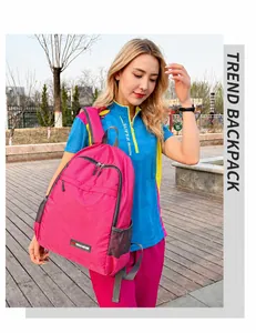 Detail of rose red foldable outdoor backpack featuring waterproof checkered fabric texture
