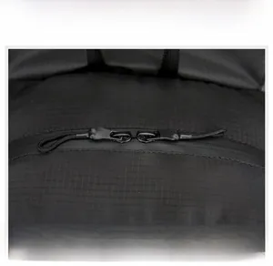 Detail of the durable black ripstop nylon fabric and smooth two-way zipper system