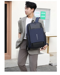 Men's business backpack with USB charging port and large capacity in dark blue