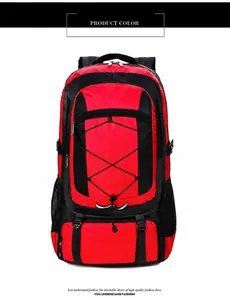 Close-up of red and black outdoor hiking backpack with bungee cords and nylon texture