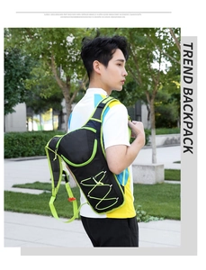 Close-up of lightweight cycling backpack with breathable mesh straps and neon green details