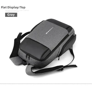 Detail of grey business laptop backpack featuring padded S-shaped straps and dual zippers