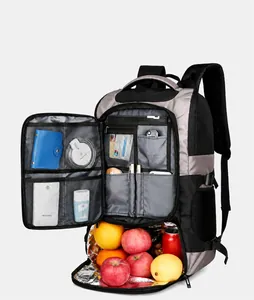 Detailed internal view of insulated picnic backpack with multiple compartments and front pockets