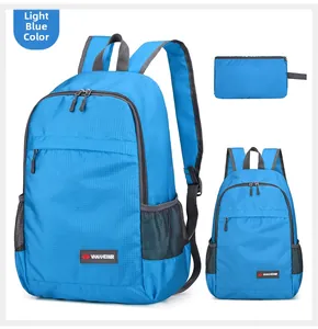 Light blue foldable lightweight backpack and storage pouch set in tear-resistant nylon
