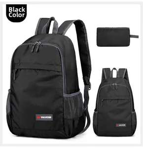 Macro detail of foldable black outdoor backpack in lightweight tear-resistant fabric