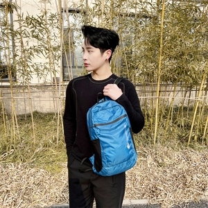 Blue waterproof folding sports backpack with adjustable straps and side mesh pocket