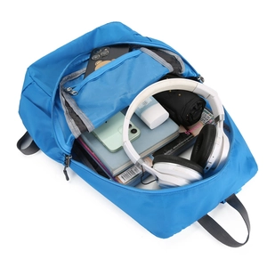 Large capacity waterproof blue nylon travel backpack showing internal storage space