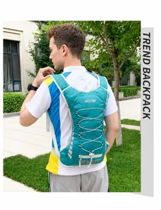 Outdoor 12L teal cycling backpack shown in use with elastic cords and reflective details