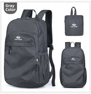 Detail showing the gray foldable backpack and its compact storage bag for outdoor travel