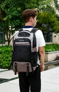 Close-up of a large-capacity waterproof insulated backpack worn during outdoor travel