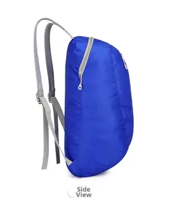 Side view of foldable blue lightweight backpack made of ripstop nylon fabric