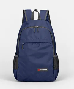 Detail view of navy blue foldable backpack showing tear-resistant fabric and side mesh pocket