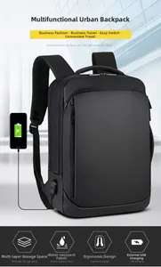 Detail of waterproof business backpack showing external USB charging port and phone connection
