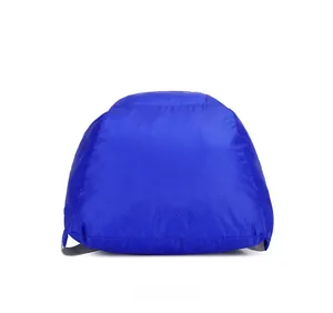 Detail view of blue nylon backpack base with honeycomb texture and durable gray straps
