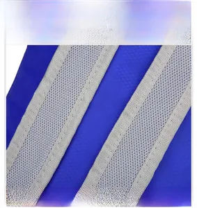 Detail of the blue checkered fabric with breathable grey honeycomb mesh shoulder straps