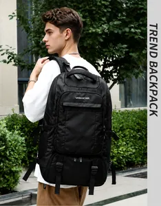 Detail of insulated picnic backpack with padded straps and brand logo on black fabric