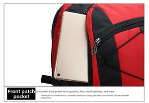 Detailed view of the red and black waterproof backpack featuring a front zipper pocket for tablets