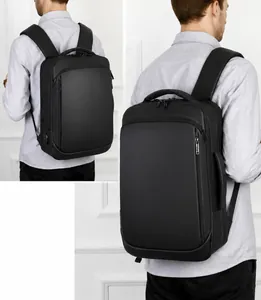 Detail view of business backpack featuring side USB charging port and waterproof matte fabric