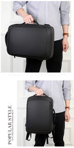 Minimalist matte black business backpack with dual-carry handles and side charging port