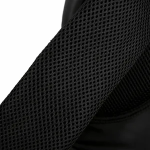 Breathable honeycomb mesh shoulder strap detail on insulated backpack for extra comfort