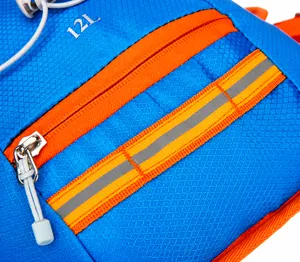 Detail of 12L outdoor cycling backpack showing honeycomb texture and safety reflective strip