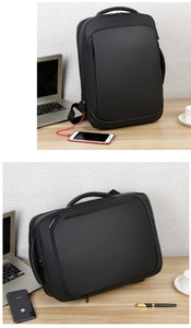 Detail view of business laptop backpack featuring a USB charging port and waterproof texture