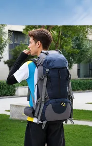 Large capacity outdoor hiking backpack with side mesh pockets worn by a model in nature
