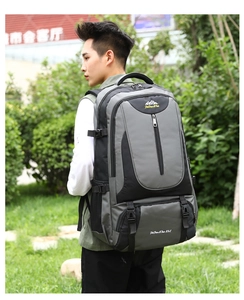 Detailed side view of 35L outdoor hiking backpack with gray and black water resistant fabric
