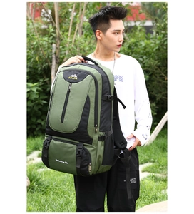 Detailed side view of an 85L large capacity olive green hiking backpack on a model