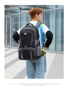 Close-up of lightweight hiking backpack with buckle straps and side mesh water bottle pocket