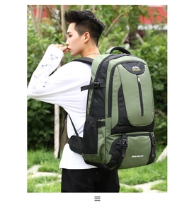 Outdoor 85L hiking backpack with green and black nylon fabric shown in mountain scenery