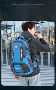 Close-up of 60L outdoor hiking backpack with adjustable chest straps and blue nylon fabric
