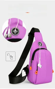 Purple nylon chest bag with earphone port and adjustable strap showing functional detail