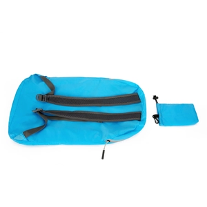 Foldable lightweight outdoor travel backpack in blue nylon with mesh straps and storage pouch