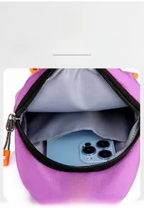 Internal view of purple oxford chest bag showing main compartment and inner pocket