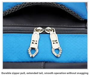 Close-up of durable dual metal zippers with extended pullers on blue outdoor backpack