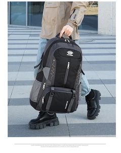 Detailed macro view of heavy-duty black and gray outdoor hiking backpack with VANAHEIMR logo