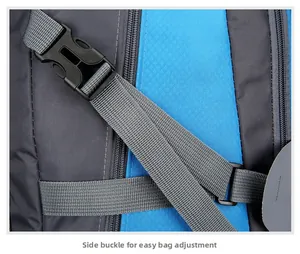 Macro detail of high-density side buckle and durable gray fabric on hiking backpack