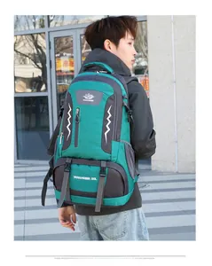 Close-up of a 60L outdoor hiking backpack with reflective strips and side mesh pockets
