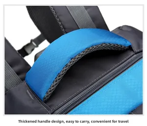 Close-up of the thickened padded handle with breathable mesh on the hiking backpack