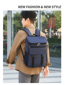 Outdoor view of a navy blue thermal insulated backpack with adjustable straps and front buckles