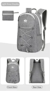 Detail view of light grey foldable backpack with storage pouch and mesh shoulder straps