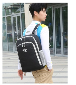 Outdoor view of lightweight sports backpack with wide shoulder straps and side mesh pocket